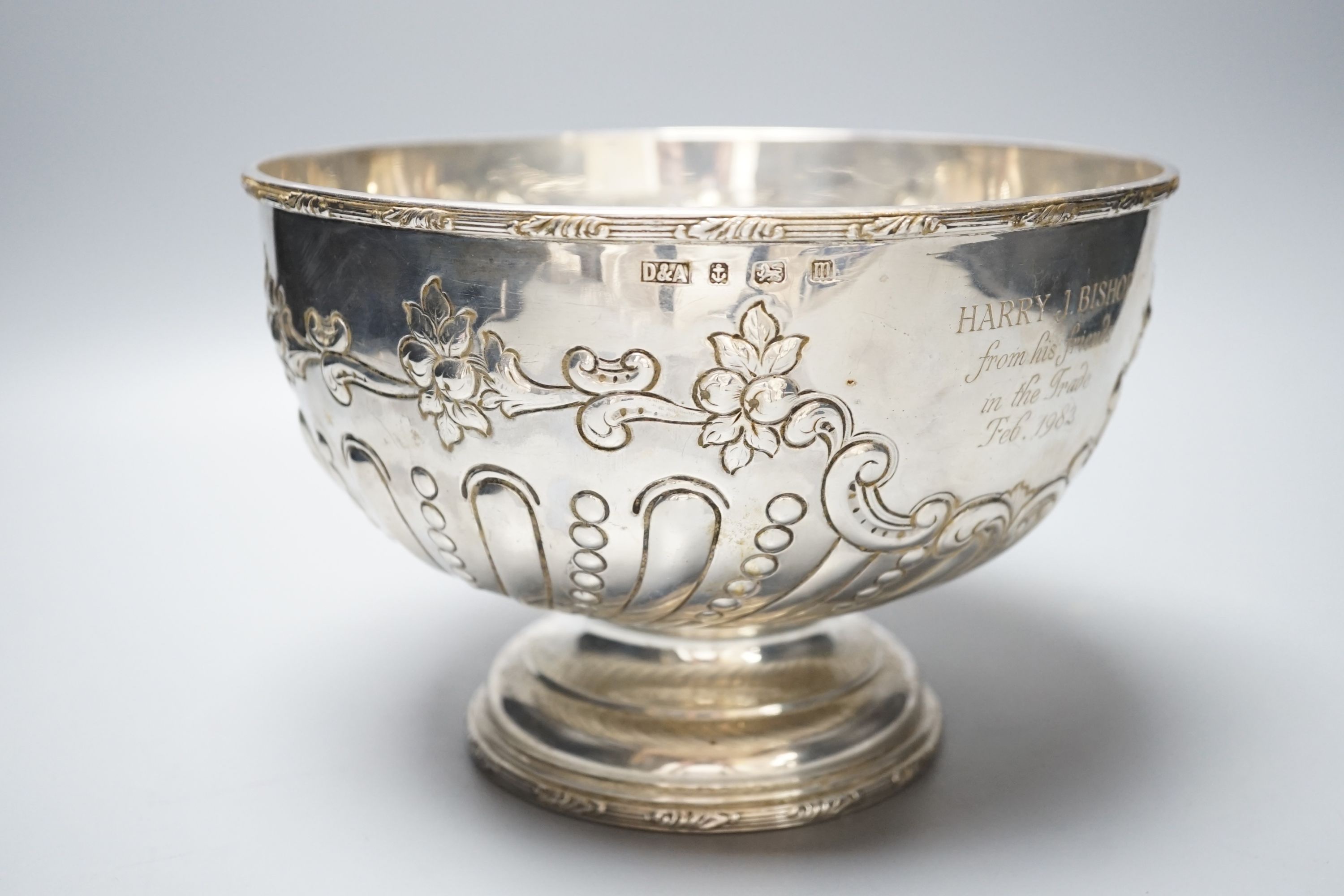 A George V embossed silver rose bowl, with later engraved inscription, Daniel & Arter, Birmingham, 1911, 22.5cm, 25oz.
